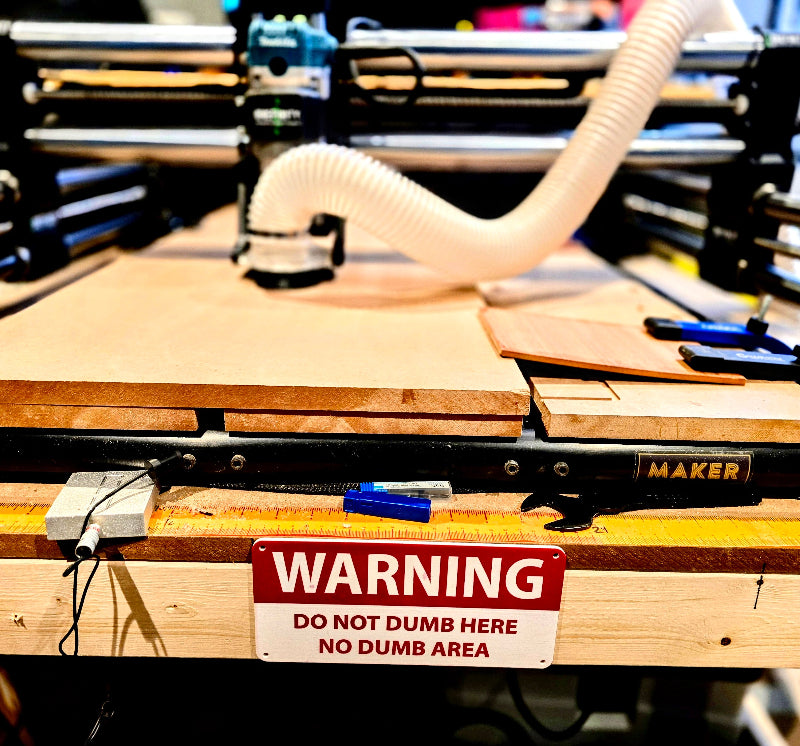 WARNING: Do Not Dumb Here, No Dumb Area Sign